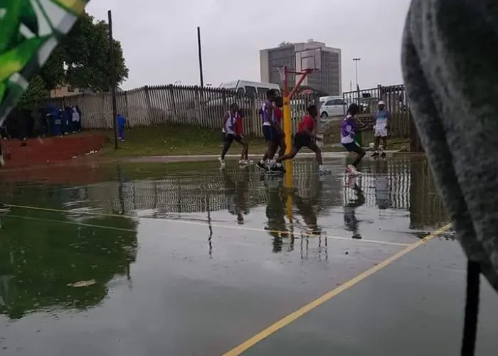 Wet netball court at the Male National Championships